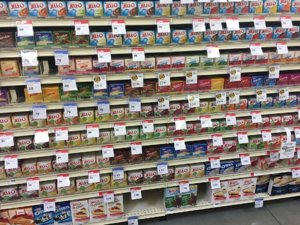 Couponing at Hy-Vee - A shelf full of jello with sale tags